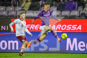 2023-01-21 - Fiorentina's Nikola Milenković fights for the ball against Torino's Nikola Vlasic - ACF FIORENTINA VS TORINO FC - ITALIAN SERIE A - SOCCER
