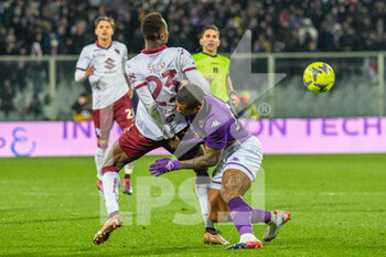 2023-01-21 - Torino's Demba Seck fights for the ball against Fiorentina's Igor - ACF FIORENTINA VS TORINO FC - ITALIAN SERIE A - SOCCER