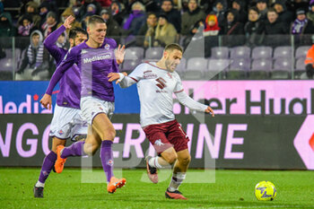 2023-01-21 - Torino's Nikola Vlasic hampered by Fiorentina's Nikola Milenković - ACF FIORENTINA VS TORINO FC - ITALIAN SERIE A - SOCCER