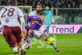 2023-01-21 - Fiorentina's Christian Kouame hampered by Torino's Koffi Djidji - ACF FIORENTINA VS TORINO FC - ITALIAN SERIE A - SOCCER