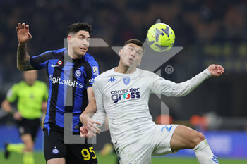 23/01/2023 - Nicolo Cambiaghi of Empoli FC competes for the ball with Alessandro Bastoni of FC Internazionale during Serie A 2022/23 football match between FC Internazionale and Empoli FC at Giuseppe Meazza Stadium, Milan, Italy on January 23, 2023 - INTER - FC INTERNAZIONALE VS EMPOLI FC - SERIE A - CALCIO