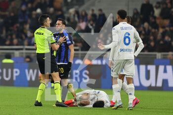 23/01/2023 - Hakan Calhanoglu of FC Internazionale protests with Referee Antonio Rapuano during Serie A 2022/23 football match between FC Internazionale and Empoli FC at Giuseppe Meazza Stadium, Milan, Italy on January 23, 2023 - INTER - FC INTERNAZIONALE VS EMPOLI FC - SERIE A - CALCIO