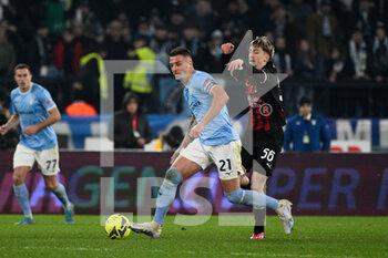 24/01/2023 - Sergej Milinkovic-Savic (SS Lazio) Alexis Saelemaekers (AC Milan) during the Italian Football Championship League A 2022/2023 match between SS Lazio vs AC Milan at the Olimpic Stadium in Rome on 24 January 2023. - SS LAZIO VS AC MILAN - SERIE A - CALCIO