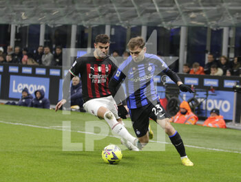 2023-02-05 - Theo Hernandez of AC Milan and Nicolo Barella of FC Internazionale during the Italian serie A, football match between Internazionale Fc and Ac Milan on 05 February 2023 at San Siro Stadium, Milan, Italy. Photo Ndrerim Kaceli - INTER - FC INTERNAZIONALE VS AC MILAN - ITALIAN SERIE A - SOCCER
