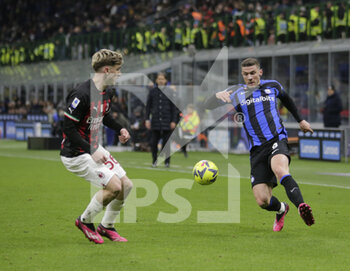 2023-02-05 - Robin Gosens of FC Internazionale and Alexis Saelemaekers of AC Milan during the Italian serie A, football match between Internazionale Fc and Ac Milan on 05 February 2023 at San Siro Stadium, Milan, Italy. Photo Ndrerim Kaceli - INTER - FC INTERNAZIONALE VS AC MILAN - ITALIAN SERIE A - SOCCER