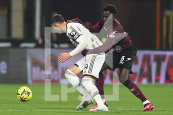 2023-02-07 - Dusan Vlahovic of Juventus FC competes for the ball with Junior Sambia of US Salernitana   during the Serie A match between US Salernitana 1919 v Juventus FC  at Arechi  Stadium  - US SALERNITANA VS JUVENTUS FC - ITALIAN SERIE A - SOCCER