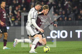 2023-02-07 - Dusan Vlahovic of Juventus FC competes for the ball with Hans Nicolussi Caviglia of US Salernitana  during the Serie A match between US Salernitana 1919 v Juventus FC  at Arechi  Stadium  - US SALERNITANA VS JUVENTUS FC - ITALIAN SERIE A - SOCCER