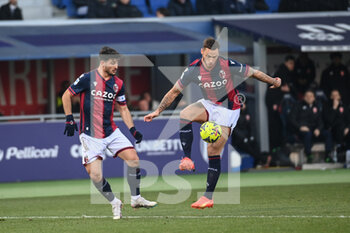 2023-02-12 - Marko Arnautovic (Bologna FC) and Riccardo Orsolinini (Bologna FC) in action - BOLOGNA FC VS AC MONZA - ITALIAN SERIE A - SOCCER