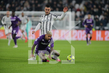 2023-02-12 - Filip Kostic of Juventus and Dodo  of Acf Fiorentina during the Italian serie A, football match between Juventus Fc and Acf Fiorentina on 12 February 2023 at Allianz Stadium, Turin, Italy. Photo Ndrerim Kaceli - JUVENTUS FC VS ACF FIORENTINA - ITALIAN SERIE A - SOCCER