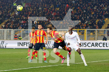 2023-02-11 - Federico Baschirotto (US Lecce) and Tammy Abraham (AS Roma) - US LECCE VS AS ROMA - ITALIAN SERIE A - SOCCER