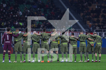 2023-02-10 - AC Milan team observe a minute of silence in respect of the victims of the earthquake in Turkey during Serie A 2022/23 football match between AC Milan and Torino FC at San Siro Stadium, Milan, Italy on February 10, 2023 - AC MILAN VS TORINO FC - ITALIAN SERIE A - SOCCER