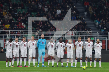 2023-02-10 - Torino FC players observe a minute of silence in respect of the victims of the earthquake in Turkey during Serie A 2022/23 football match between AC Milan and Torino FC at San Siro Stadium, Milan, Italy on February 10, 2023 - AC MILAN VS TORINO FC - ITALIAN SERIE A - SOCCER
