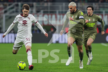 2023-02-10 - Aleksej Miranchuk of Torino FC and Theo Hernandez of AC Milan in action during Serie A 2022/23 football match between AC Milan and Torino FC at San Siro Stadium, Milan, Italy on February 10, 2023 - AC MILAN VS TORINO FC - ITALIAN SERIE A - SOCCER