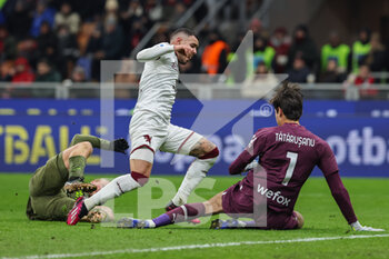 2023-02-10 - Antonio Sanabria of Torino FC in action with Ciprian Tatarusanu of AC Milan during Serie A 2022/23 football match between AC Milan and Torino FC at San Siro Stadium, Milan, Italy on February 10, 2023 - AC MILAN VS TORINO FC - ITALIAN SERIE A - SOCCER