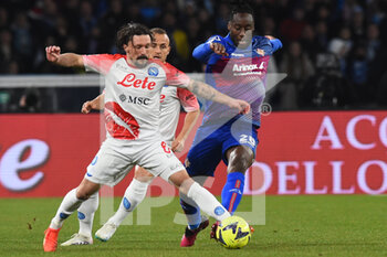 2023-02-12 - Mario Rui of SSC Napoli  competes for the ball with Soualhio Meitr of US Cremonese  during the Serie A match between SSC Napoli v Cremonese SC at Diego Armando Maradona  Stadium  - SSC NAPOLI VS US CREMONESE - ITALIAN SERIE A - SOCCER