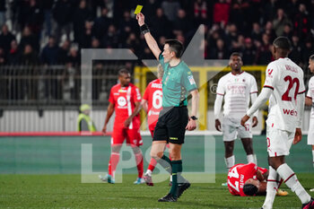 2023-02-18 - Antonio Rapuano (Referee) shows the yellow card - AC MONZA VS AC MILAN - ITALIAN SERIE A - SOCCER