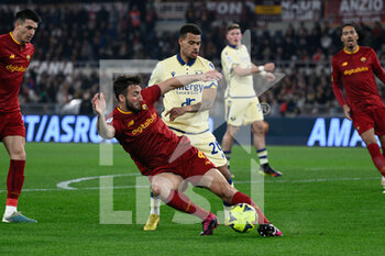 2023-02-19 - Bryan Cristante (AS Roma)  Cyril Ngonge (Hellas Verona)  during the Italian Football Championship League A 2022/2023 match between AS Roma vs Hellas Verona at the Olimpic Stadium in Rome  on 19 February 2023. - AS ROMA VS HELLAS VERONA - ITALIAN SERIE A - SOCCER