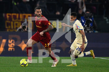 2023-02-19 - Leonardo Spinazzola (AS Roma) Cyril Ngonge (Hellas Verona)  during the Italian Football Championship League A 2022/2023 match between AS Roma vs Hellas Verona at the Olimpic Stadium in Rome  on 19 February 2023. - AS ROMA VS HELLAS VERONA - ITALIAN SERIE A - SOCCER