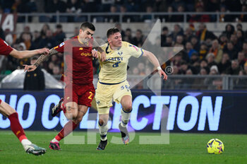 2023-02-19 - Gianluca Mancini (AS Roma)  Adolfo Gaich (Hellas Verona) during the Italian Football Championship League A 2022/2023 match between AS Roma vs Hellas Verona at the Olimpic Stadium in Rome  on 19 February 2023. - AS ROMA VS HELLAS VERONA - ITALIAN SERIE A - SOCCER