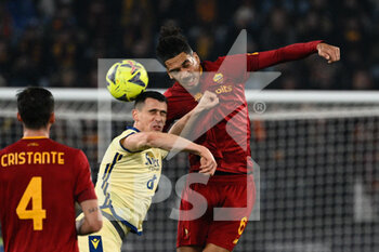 2023-02-19 - Chris Smalling (AS Roma)  Kevin Lasagna (Hellas Verona) during the Italian Football Championship League A 2022/2023 match between AS Roma vs Hellas Verona at the Olimpic Stadium in Rome  on 19 February 2023. - AS ROMA VS HELLAS VERONA - ITALIAN SERIE A - SOCCER