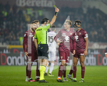 2023-02-20 - Refree showing a yellow card to Mergim Vojvoda of Torino FC during the Italian Serie A, football match between Torino FC and Us Cremonese, on 20 February 2023 at Stadio Olimpico Grande Torino in Turin, Italy. Photo Ndrerim Kaceli - TORINO FC VS US CREMONESE - ITALIAN SERIE A - SOCCER