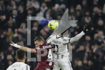 2023-02-28 - Juan Cuadrado of Juventus and Alessandro Buongiorno of Torino FC during the Italian Serie A, football match between Juventus Fc and Torino Fc, on 28 February 2023 at Allianz Stadium, Turin, Italy. Photo Ndrerim Kaceli - JUVENTUS FC VS TORINO FC - ITALIAN SERIE A - SOCCER
