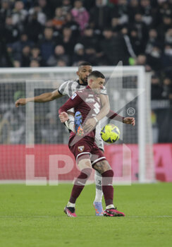 2023-02-28 - Bremer of Juventus and Antonio Sanabria of Torino FC during the Italian Serie A, football match between Juventus Fc and Torino Fc, on 28 February 2023 at Allianz Stadium, Turin, Italy. Photo Ndrerim Kaceli - JUVENTUS FC VS TORINO FC - ITALIAN SERIE A - SOCCER
