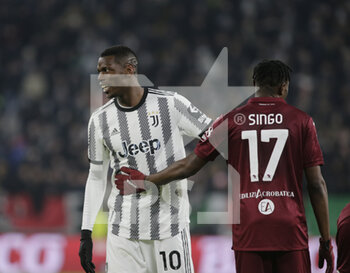 2023-02-28 - Paul Pogba of Juventus and Stephane Singo of Torino FC during the Italian Serie A, football match between Juventus Fc and Torino Fc, on 28 February 2023 at Allianz Stadium, Turin, Italy. Photo Ndrerim Kaceli - JUVENTUS FC VS TORINO FC - ITALIAN SERIE A - SOCCER