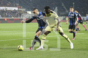 2023-03-04 - Merih Demiral of Atalanta BC  competes for the ball with Isaac Success of Udinese FC during Atalanta FC vs Udinese FC, 25° Serie A Tim 2022-23 game at Gewiss - Atleti azzurri d'Italia Stadium in Bergamo (BG), Italy, on March 04, 2022. - ATALANTA BC VS UDINESE CALCIO - ITALIAN SERIE A - SOCCER