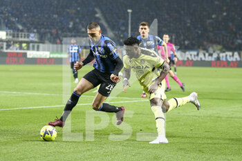 2023-03-04 - Merih Demiral of Atalanta BC  battle for the ball with Isaac Success of Udinese FC  during Atalanta FC vs Udinese FC, 25° Serie A Tim 2022-23 game at Gewiss - Atleti azzurri d'Italia Stadium in Bergamo (BG), Italy, on March 04, 2022. - ATALANTA BC VS UDINESE CALCIO - ITALIAN SERIE A - SOCCER