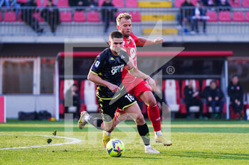 2023-03-04 - Razvan Marin (Empoli FC) and Christian Gytkjaer (AC Monza) - AC MONZA VS EMPOLI FC - ITALIAN SERIE A - SOCCER