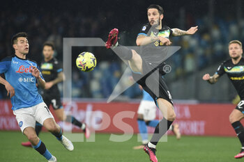 2023-03-03 - Luis Alberto of SS Lazio competes for the ball with Hirving Lozano of SSC Napoli  the Serie A match between SSC Napoli vs SS Lazio  at Diego Armando Maradona Stadium   - SSC NAPOLI VS SS LAZIO - ITALIAN SERIE A - SOCCER