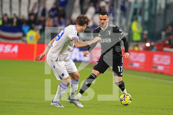 2023-03-12 - Filip Kostic (Juventus FC) in action against Alessandro Zanoli (UC Sampdoria) - JUVENTUS FC VS UC SAMPDORIA - ITALIAN SERIE A - SOCCER
