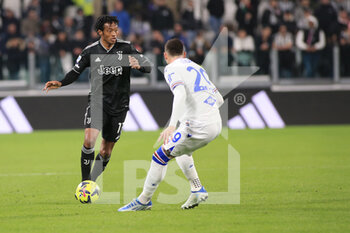2023-03-12 - Juan Guillermo Cuadrado Bello (Juventus FC) in action against Nicola Murru (UC Sampdoria) - JUVENTUS FC VS UC SAMPDORIA - ITALIAN SERIE A - SOCCER