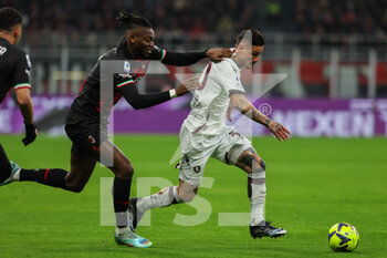 2023-03-13 - Pasquale Mazzocchi of US Salernitana 1919 competes for the ball with Rafael Leao of AC Milan during Serie A 2022/23 football match between AC Milan and US Salernitana 1919 at San Siro Stadium, Milan, Italy on March 13, 2023 - AC MILAN VS US SALERNITANA - ITALIAN SERIE A - SOCCER