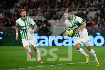 2023-03-12 - Domenico Berardi (US Sassuolo) celebrates after scoring the goal 1-3 during the Italian Football Championship League A 2022/2023 match between AS Roma vs US Sassuolo at the Olimpic Stadium in Rome  on 12 March 2023. - AS ROMA VS US SASSUOLO - ITALIAN SERIE A - SOCCER