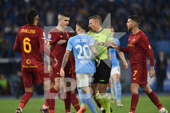 2023-03-19 - ROME, ITALY - March 19: The Referee Davide Massa gestures at the players  during the Italian Serie A soccer  match between SS Lazio and AS Roma   Stadio Olimpico  on March 19,2023 in Rome, Italy. - SS LAZIO VS AS ROMA - ITALIAN SERIE A - SOCCER