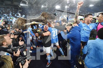 2023-03-19 - 
ROME, ITALY - March 19 :  Players SS Lazio Celebrate  after  winning the Italian Serie A soccer match between  
SS Lazio and  AS Roma at Stadio Olimpico on  March 19,2023  in Rome Italy   - SS LAZIO VS AS ROMA - ITALIAN SERIE A - SOCCER