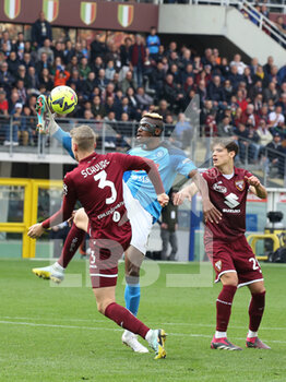 19/03/2023 - Victor Osimhen (SSC Napoli) in action between Perr Schuurs (Torino FC) and Samuele Ricci (Torino FC) - TORINO FC VS SSC NAPOLI - SERIE A - CALCIO