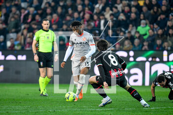 18/03/2023 - Udinese's Destiny Iyenoma Udogie in action against Milan's Sandro Tonali - UDINESE CALCIO VS AC MILAN - SERIE A - CALCIO