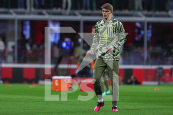 2023-04-07 - Charles De Ketelaere of AC Milan warms up during Serie A 2022/23 football match between AC Milan and Empoli FC at San Siro Stadium, Milan, Italy on April 07, 2023 - AC MILAN VS EMPOLI FC - ITALIAN SERIE A - SOCCER