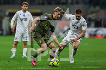 2023-04-07 - Alexis Saelemaekers of AC Milan in action during Serie A 2022/23 football match between AC Milan and Empoli FC at San Siro Stadium, Milan, Italy on April 07, 2023 - AC MILAN VS EMPOLI FC - ITALIAN SERIE A - SOCCER
