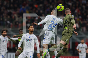 2023-04-07 - Ante Rebic of AC Milan and Tyronne Ebuehi of Empoli FC in action during Serie A 2022/23 football match between AC Milan and Empoli FC at San Siro Stadium, Milan, Italy on April 07, 2023 - AC MILAN VS EMPOLI FC - ITALIAN SERIE A - SOCCER