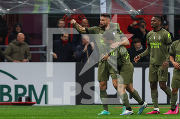 2023-04-07 - Olivier Giroud of AC Milan celebrates his goal with his teammate Alessandro Florenzi of AC Milan that was later disallowed by VAR during Serie A 2022/23 football match between AC Milan and Empoli FC at San Siro Stadium, Milan, Italy on April 07, 2023 - AC MILAN VS EMPOLI FC - ITALIAN SERIE A - SOCCER