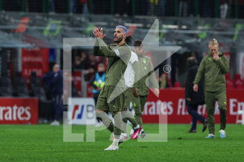 2023-04-07 - Theo Hernandez of AC Milan greets the fans during Serie A 2022/23 football match between AC Milan and Empoli FC at San Siro Stadium, Milan, Italy on April 07, 2023 - AC MILAN VS EMPOLI FC - ITALIAN SERIE A - SOCCER
