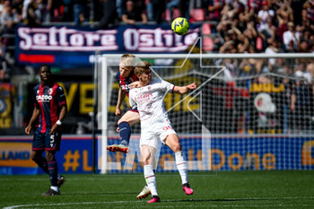 2023-04-15 - Milan's Charles De Ketelaere in action against Bologna's Jerdy Schouten - BOLOGNA FC VS AC MILAN - ITALIAN SERIE A - SOCCER