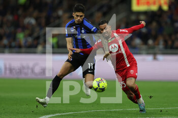 2023-04-15 - Joaquin Correa of FC Internazionale competes for the ball with Armando Izzo of AC Monza during Serie A 2022/23 football match between FC Internazionale and AC Monza at Giuseppe Meazza Stadium, Milan, Italy on April 15, 2023 - INTER - FC INTERNAZIONALE VS AC MONZA - ITALIAN SERIE A - SOCCER