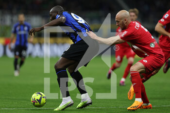 2023-04-15 - Romelu Lukaku of FC Internazionale competes for the ball with Luca Caldirola of AC Monza during Serie A 2022/23 football match between FC Internazionale and AC Monza at Giuseppe Meazza Stadium, Milan, Italy on April 15, 2023 - INTER - FC INTERNAZIONALE VS AC MONZA - ITALIAN SERIE A - SOCCER