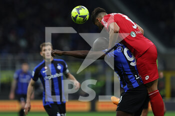 2023-04-15 - Pablo Mari of AC Monza competes for the ball with Romelu Lukaku of FC Internazionale during Serie A 2022/23 football match between FC Internazionale and AC Monza at Giuseppe Meazza Stadium, Milan, Italy on April 15, 2023 - INTER - FC INTERNAZIONALE VS AC MONZA - ITALIAN SERIE A - SOCCER