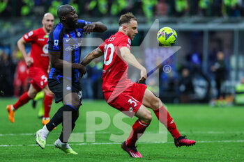 2023-04-15 - Romelu Lukaku of FC Internazionale competes for the ball with Carlos Augusto of AC Monza during Serie A 2022/23 football match between FC Internazionale and AC Monza at Giuseppe Meazza Stadium, Milan, Italy on April 15, 2023 - INTER - FC INTERNAZIONALE VS AC MONZA - ITALIAN SERIE A - SOCCER